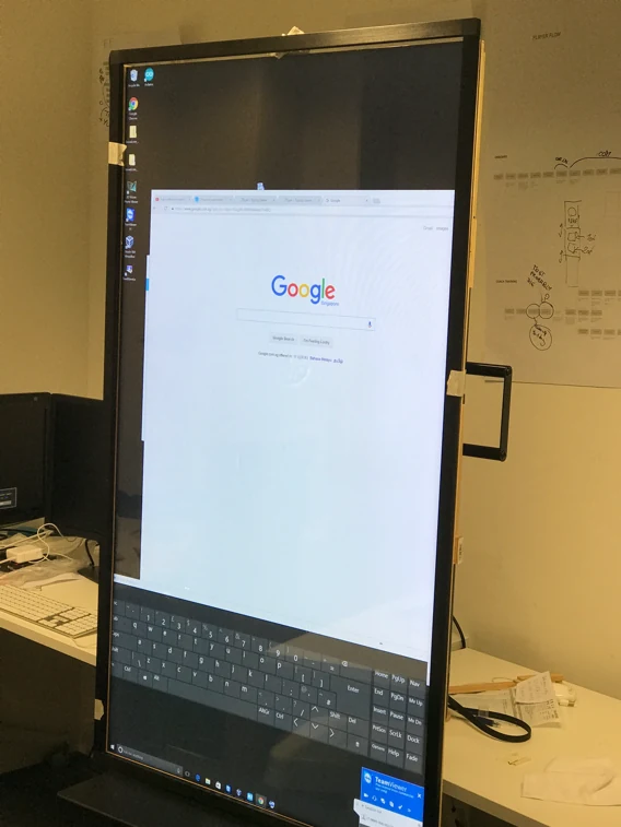 The kiosk hardware in the studio, the touchscreen running at full height.